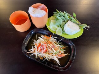 Som tam or Thai green papaya salad, famous Thai food