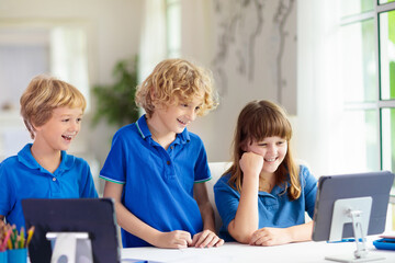 Online remote learning. School kids with computer. - 780399484