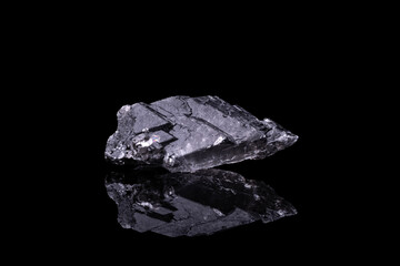 grey Gypsum from France, photography isolated on black background. macro detail close-up rough raw unpolished semi-precious gemstone.
