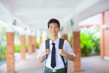 Kids back to school. Asian student with backpack. - 780404093