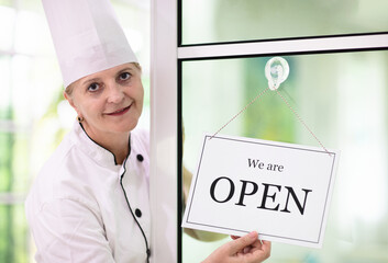 Café opening on first day. Open door sign. - 780405250