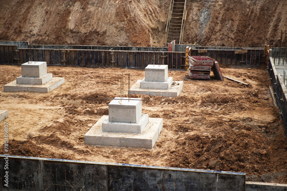 Poster monolithic reinforced concrete foundations for the construction of a large building. grillage at the