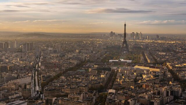 Aerial view streets of Paris, France, overlooking the famous eiffel tower of paris at sunset.