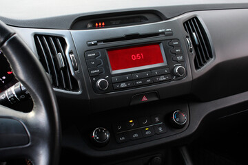 Fototapeta premium Modern car interior with multimedia and climate control. Car dashboard. Modern car dashboard. Car climate control. Multimedia system.