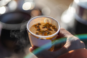 Selective focus Yellow dried chrysanthemum flowers in a hot water glass in the morning. Refreshing,...