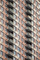 Vertical shot of a large modern condo apartment building in New York