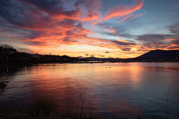scenic sunset with clouds in winter over txingudi bay in hendaye