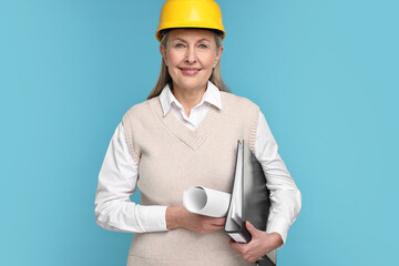 Architect in hard hat with draft and folder on light blue background