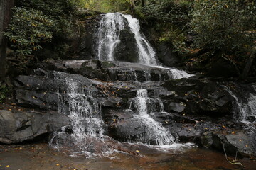 Beautiful landscape of a waterfall in a dense forest