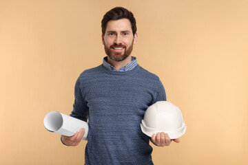 Architect with hard hat and draft on beige background