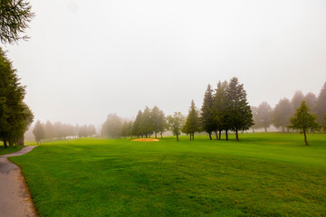 Golf Course with Fog in Crans Montana in Valais, Switzerland.
