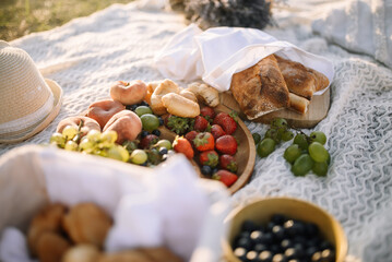 Aromatic pleasure: fresh fruit and bread in the sunset