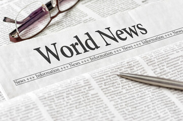 A newspaper with the headline World news - 780435680