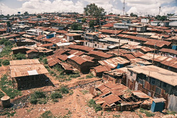 Fototapeta premium many poor houses in slums with high population density. The concept of poverty in third World countries.