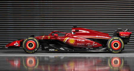 Obraz premium Ferrari SF-24 F1 2024 Formula One car in photo studio.