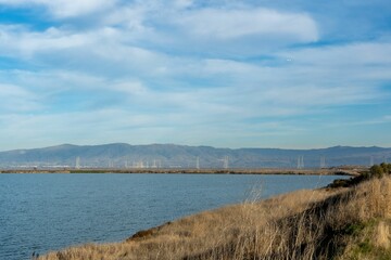 Beautiful view of a calm river under a blue sky