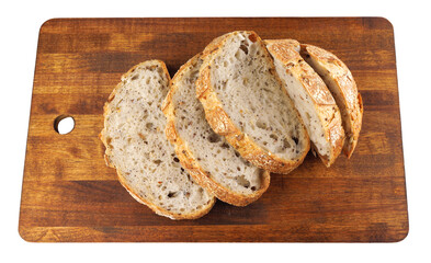 Cut loaf with seeds on a wooden board isolated on a white background. Sliced pieces of bread. Art bread