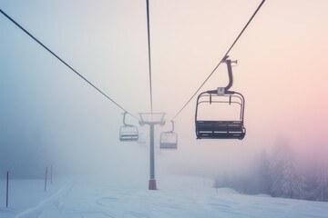 Fototapeta na wymiar Foggy Winter Adventure: Ski Chairlift on Snowy Mountain for Sport and Vacation