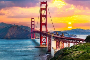 Gorgeous view of the Golden Gate Bridge in San Francisco, California during a vibrant yellow sunset