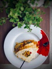 Vertical top shot of Quesadilla on the plate for breakfast
