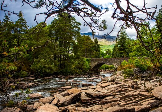 Beautiful landscape of a bridge over the river in Killin, Scotland.