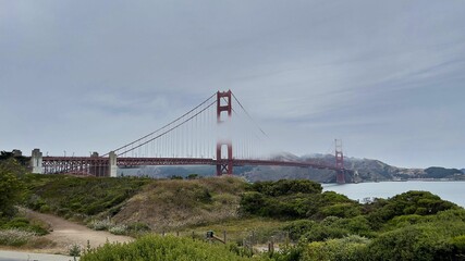 Fototapeta premium Peaceful view of the Golden Gate Bridge in the clouds, San Francisco, California, USA