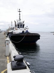 Vertical shot of a Tug boat on the harbor in Hobart, Tasmania, Australia