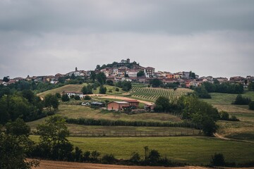 Fototapeta na wymiar Small village in the hill on a gloomy day