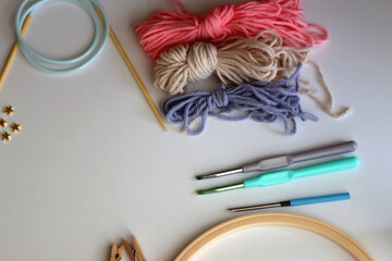 Various craft supplies on white background. Supplies for jewelry making, drawing and needlework....
