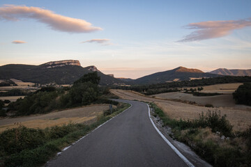 Fototapeta premium beautiful sunset and empty road landscape in galdeano, navarra, spain
