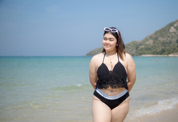 Portrait young asian woman fat chubby cute beautiful smile happy fun enjoy relax bikini swimwear...