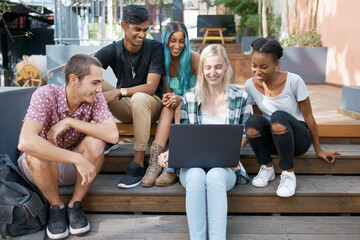 Campus steps, laptop and friends at university for learning, research or brainstorming group...