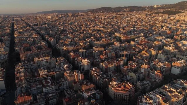 Panoramic aerial view of Barcelona cityscape with octagon buildings. Streets and blocks