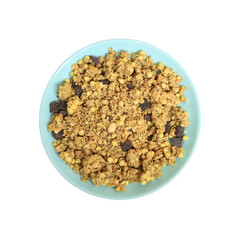Blue-green plate with wheat muesli and oat flakes with chocolate