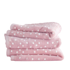 A close up of a stack of pink towels with white polka dots