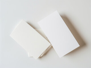 Mockup of Blank empty white cards on a white background, ideal for mockup design like poster, notepad, invitation card, presentation, business card, brochure - obrazy, fototapety, plakaty