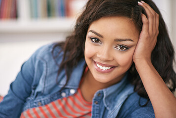 Happy, relax and portrait of black woman in home for calm weekend, break and peace in morning. Female person, house and smile in living room for me time, self care and carefree positivity on Sunday