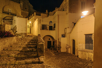 Matera street by night, Italy - 780487608