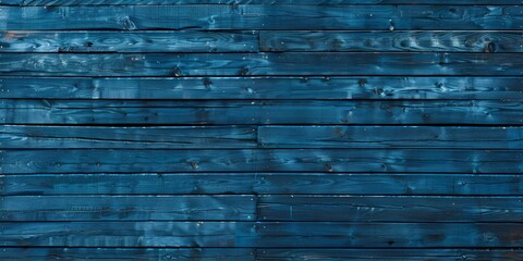 a blue wood wall with knots