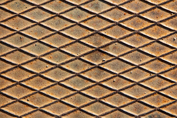Rusty metal diamond plate texture. Abstract rusty metal plate and texture for design.