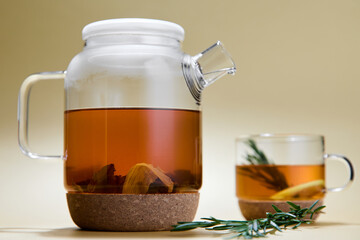 Herbal tea brewed in a teapot and mug