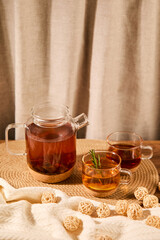 Brewed tea in a glass mug for morning wakefulness