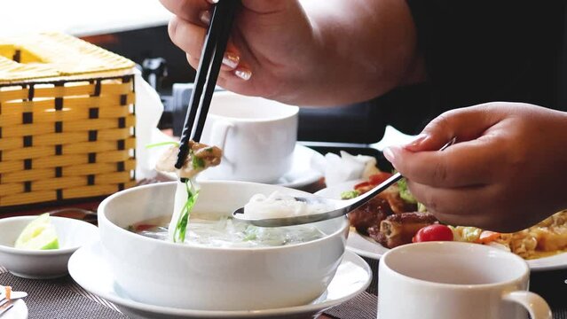 Eating Pho with Chopsticks and Spoon