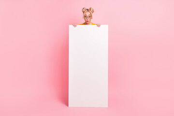 Full body photo of curious blond lady look advert wear eyewear isolated on pink background