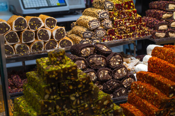 Traditional Turkish delight on the counter in close-up. Delicious, varied Turkish sweets