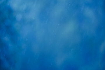 Abstract blue background with raindrops and bokeh. Spring Abstract Background
