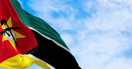 Close-up of Mozambique national flag waving on a clear day - 780508846