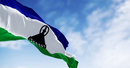 National flag of Lesotho waving in the wind on a clear day - 780508851