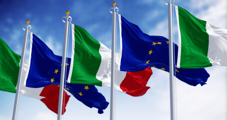 Italy and European Union flags waving on a clear day - 780508856
