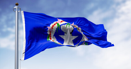 Flag of the Northern Mariana Islands waving in the wind on a clear day - 780509062